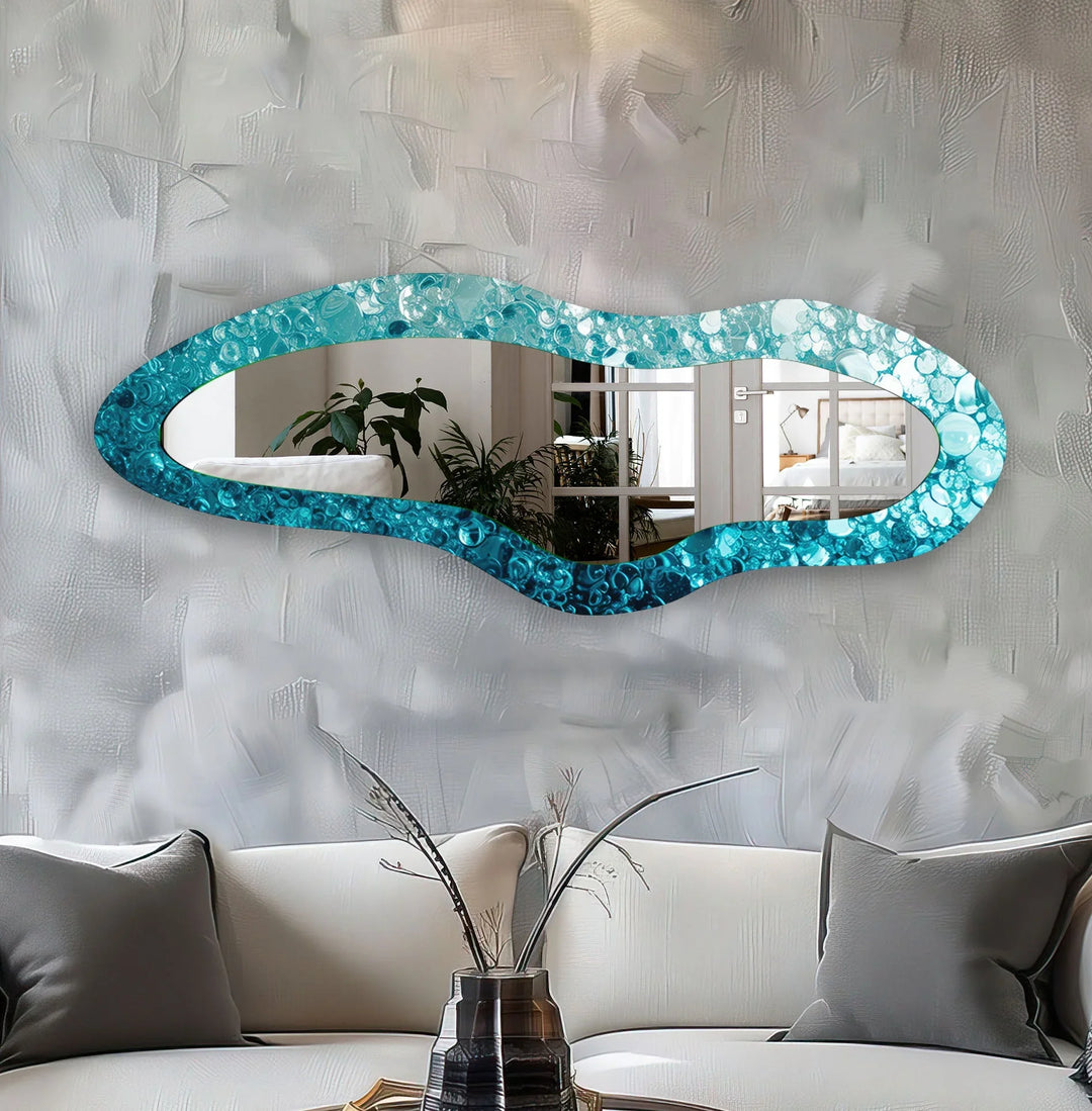 Wall mirrors designed with decorative accents to serve as both art and practicality