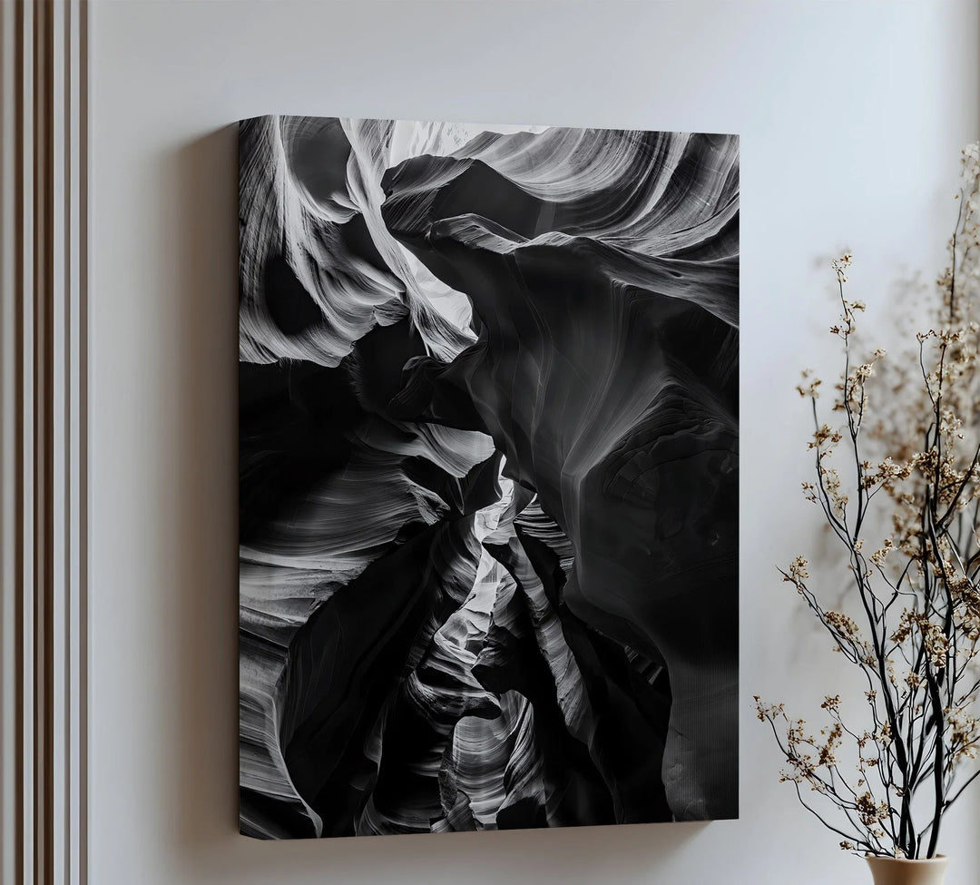 Layered rock shadows swirl in this dramatic canvas wall art, a tribute to nature’s sculptural power.