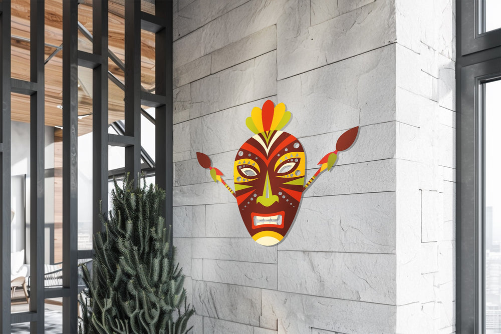 Bold red and yellow tribal metal mask decor for modern interiors