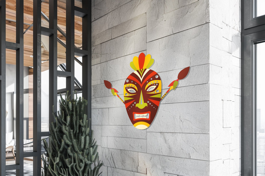 Bold red and yellow tribal metal mask decor for modern interiors