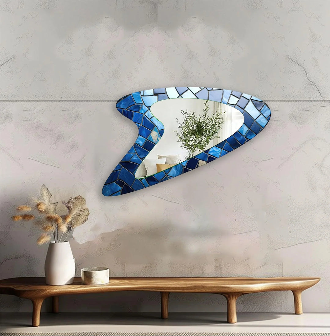 Decorative wall mirror with unique shapes and reflective surfaces for a chic statement