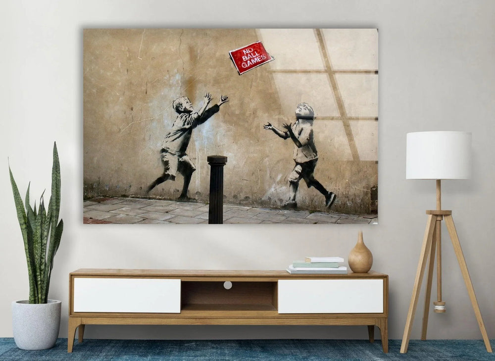 Banksy No Ball Games Glass Wall Art - Transform your home with Banksy wall art, available in various sizes and designs. Shop our collection of Banksy paintings for sale, including original art and prints. Buy Banksy art and enjoy the vibrant, thought-provoking imagery that defines his work.