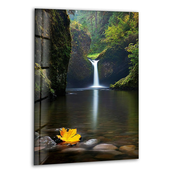 Serene forest waterfall flowing into a reflective pool, printed on glass wall art.