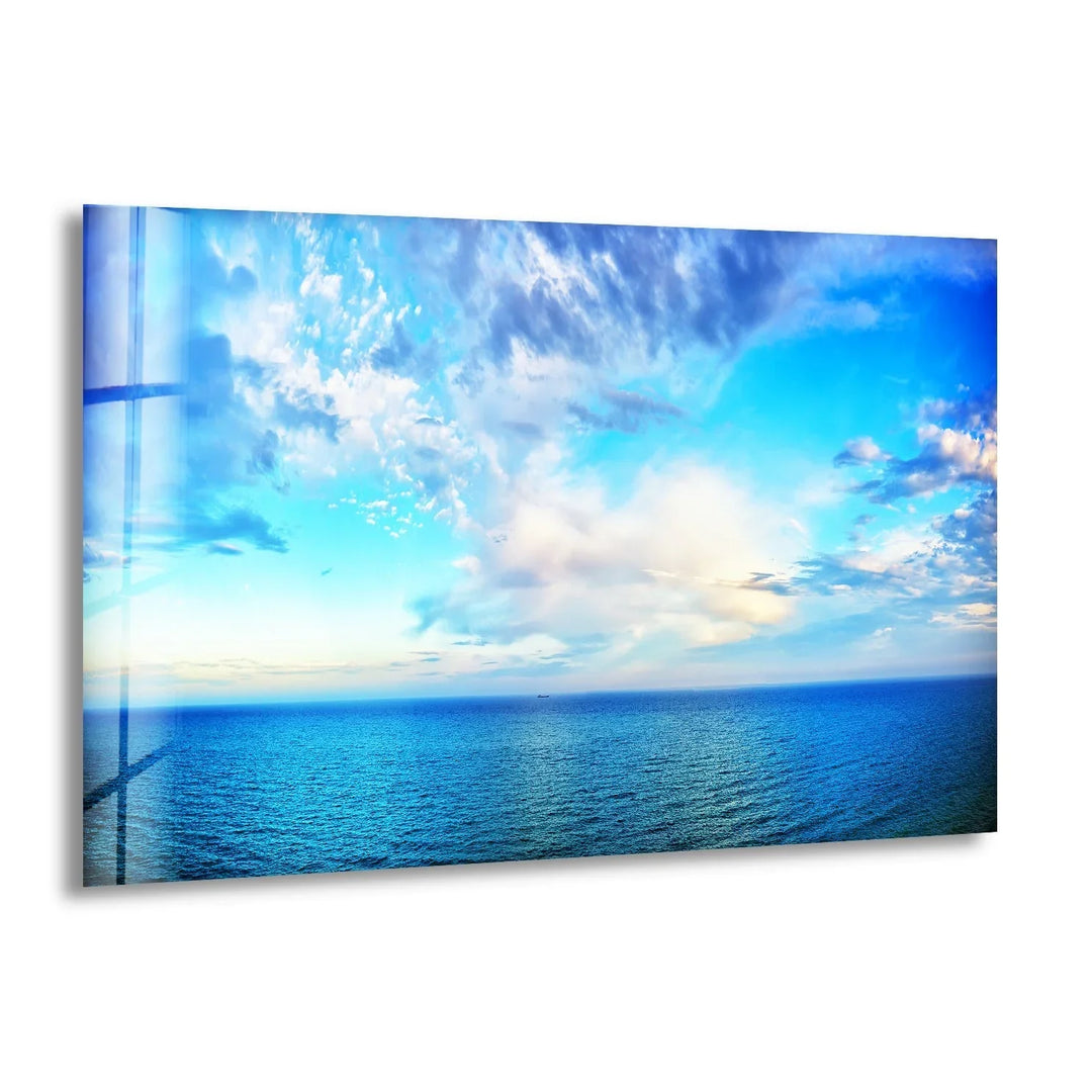 Embrace the beauty of the endless blue horizon and waves crashing gently on the shore, bringing serenity to your space.
