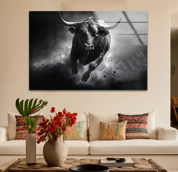 Sophisticated black and white framed art capturing the strength and grace of a bull in motion