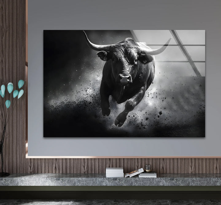 Bold black and white framed art of a bull in motion blending energy with timeless sophistication
