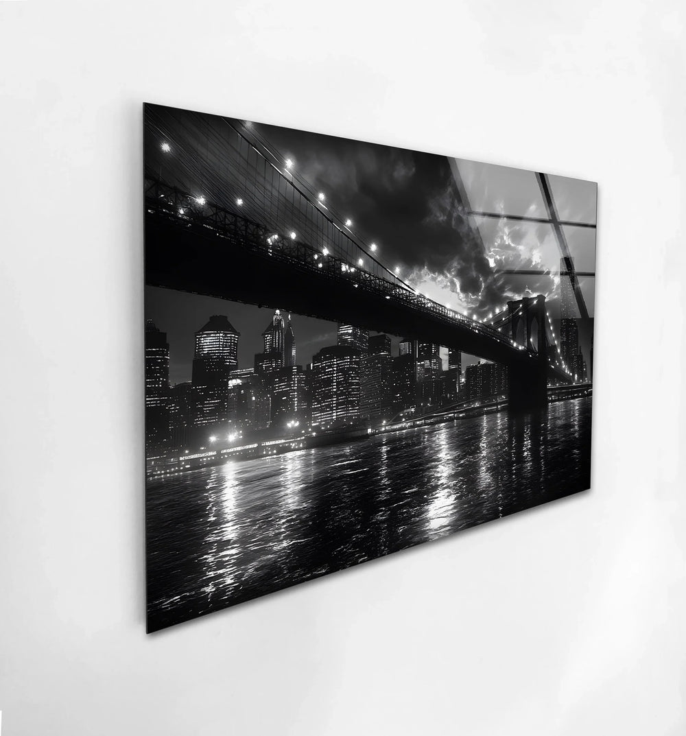 Elegant cityscape artwork in black and white, capturing the iconic Brooklyn Bridge at night.