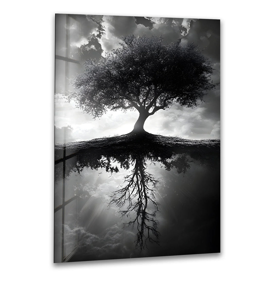 A mesmerizing black and white glass wall art featuring a majestic tree with its intricate reflection.