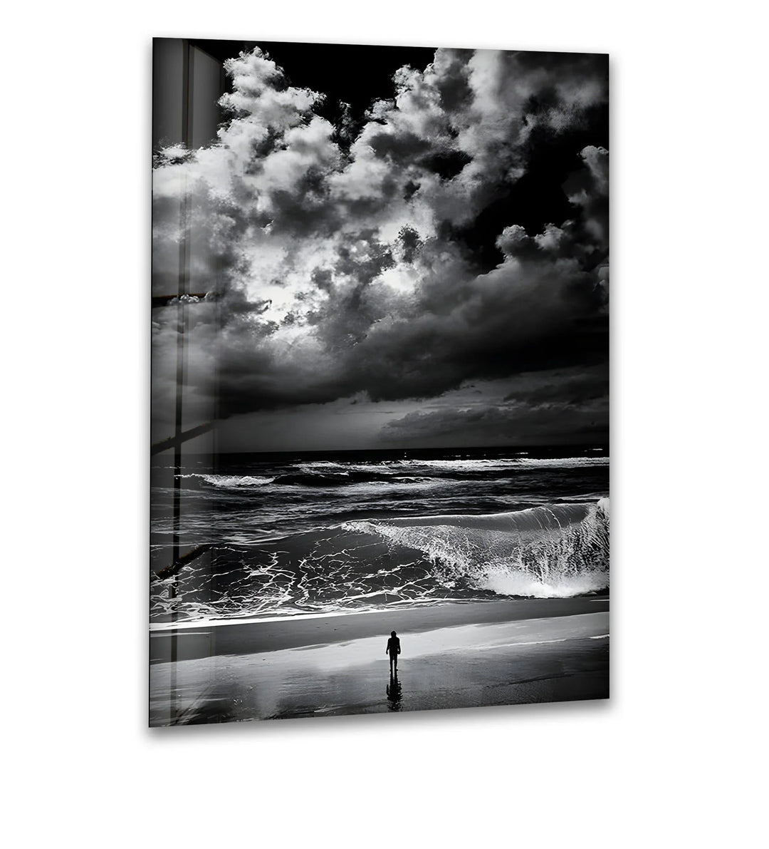 A breathtaking black and white glass wall art piece capturing the intensity of the ocean and stormy sky.