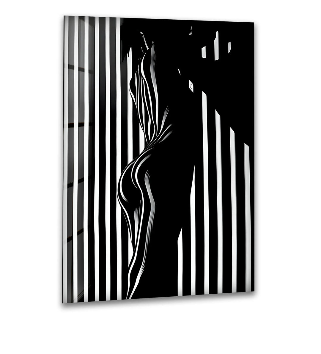A striking black and white glass wall art featuring a bold abstract silhouette in high contrast.