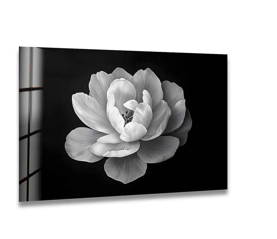 A stunning black and white glass wall art featuring a delicately detailed blooming flower.