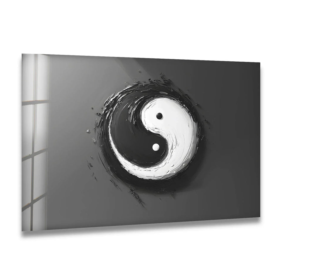 A striking black and white glass wall art featuring a bold brushstroke yin-yang symbol.