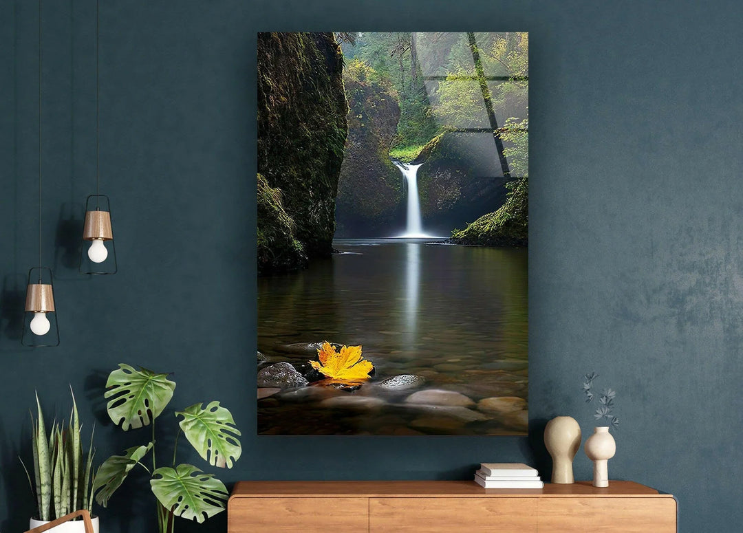 Tranquil nature-inspired glass wall art featuring a peaceful waterfall and still waters.
