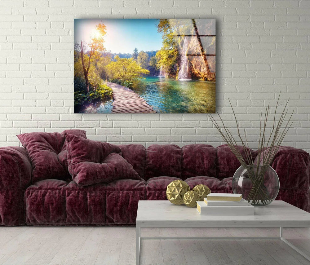 Stunning landscape wall art of a wooden walkway over crystal-clear lakes surrounded by vibrant nature.