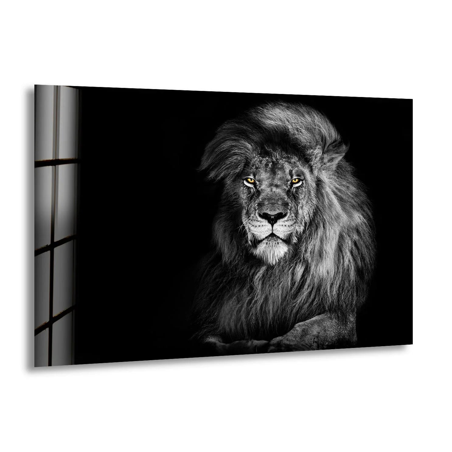 A majestic lion art from glass is set against a stark, black background with faint light from a grid-like window on the left.