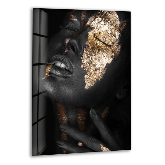 Intense gold saturation highlights the striking black woman portrait in this best glass art piece.