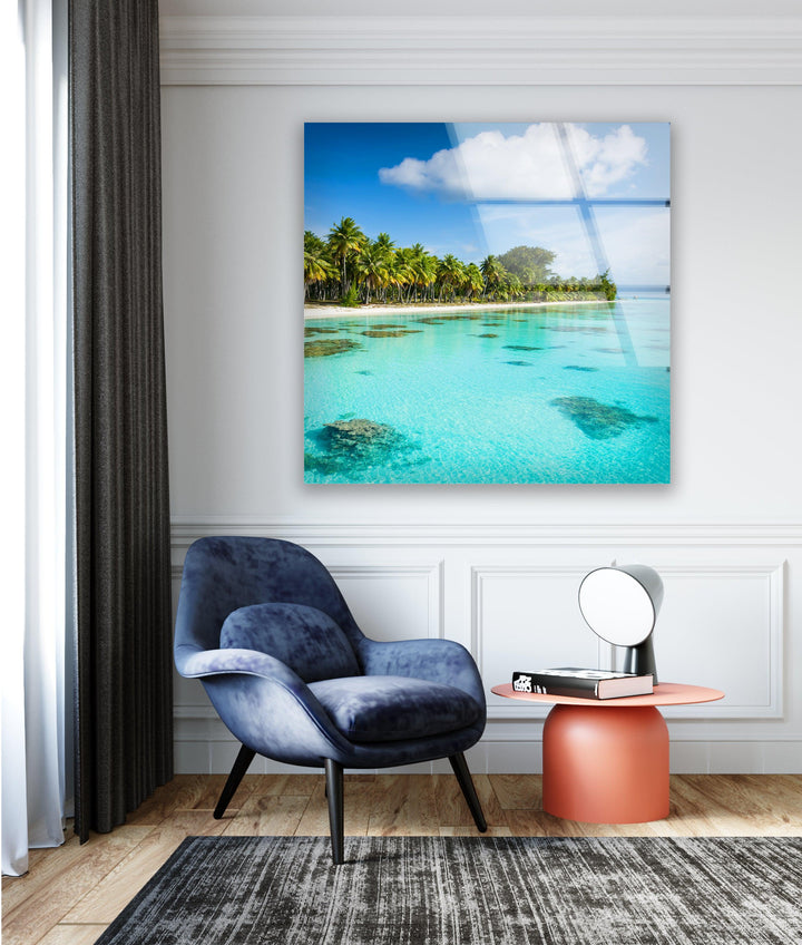 Modern home decor featuring a tropical beach scene with rich blues and greens.
