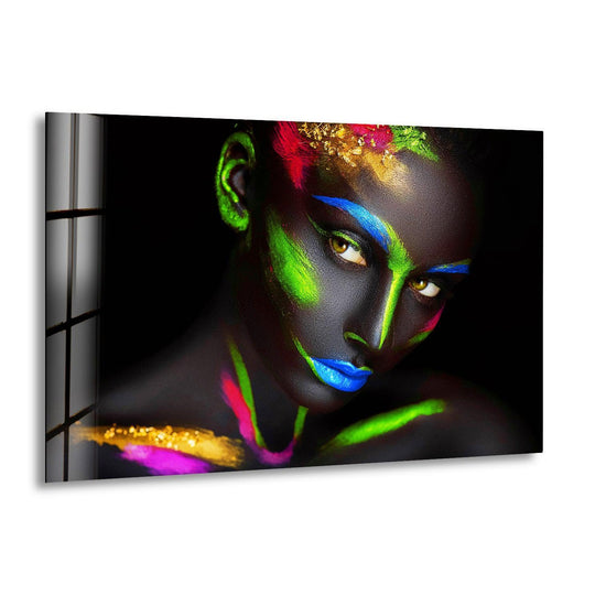 Vibrant strokes of neon paint appear to dance across a woman's face in this striking piece of art from glass.