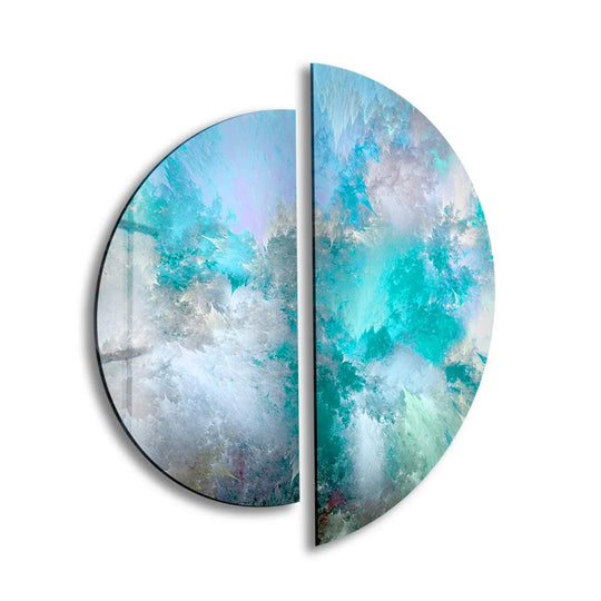 Cool color temperature dominates this two piece round blue abstract art from glass, with hues ranging from icy white to deep turquoise, creating a serene effect.