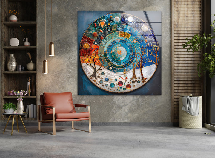 Striking color contrast on the cosmic cycle mandala tempered glass wall art blends warm autumn tones with cool winter blues.