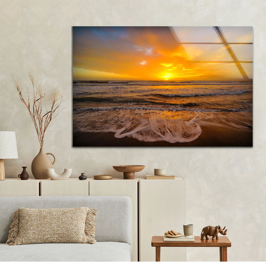 Reflected on the seashore, the softest element in this tempered glass printing wall art is the golden sunset, an ocean waves landscape wall art masterpiece.