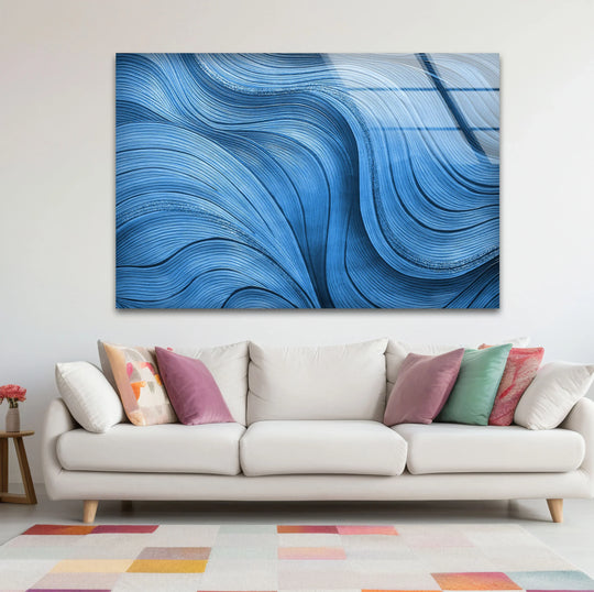 Abstract blue flow line glass wall art with organic, wave-like forms, perfect for modern decorative wall art.