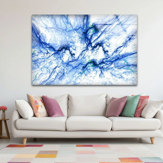 Soft wispy tendrils of electric blue and emerald green veins form a delicate, ethereal pattern on this abstract glass wall art.
