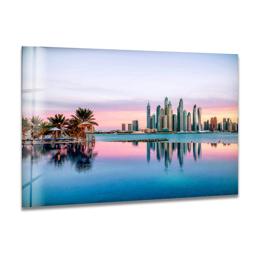 Featuring a lustrous glass printing finish, this Dubai Skyline glass wall art captures a majestic, reflected view of Palm Jumeirah and its iconic skyscrapers.