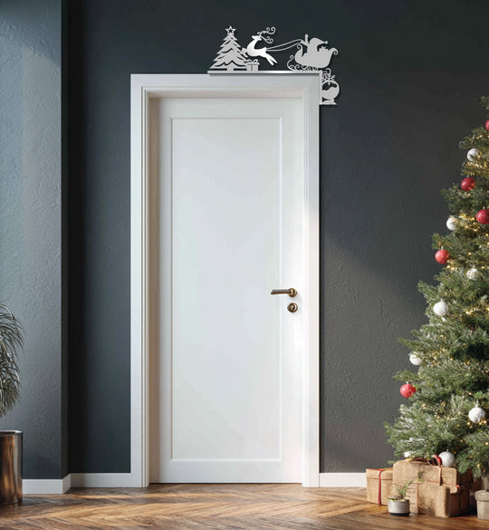 Reflecting light, the door presents a unique metal wall art of a Santa sleigh and Christmas tree, adorning the entryway with holiday cheer.