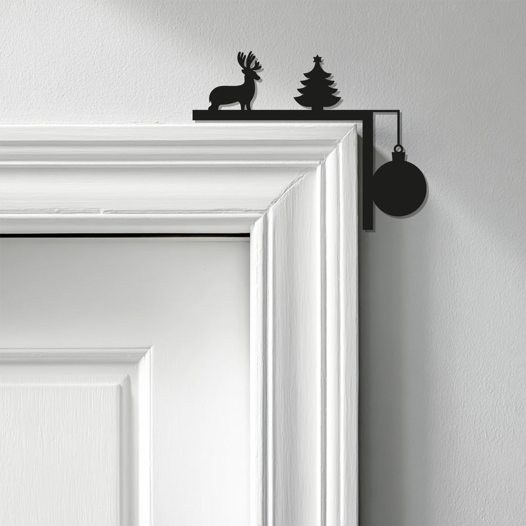 سحر الشتاء – ديكور معدني للمدفأة على شكل غزال الرنة وشجرة