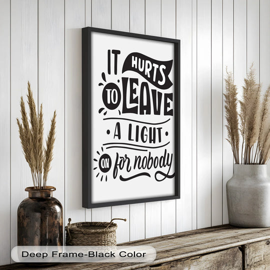 The focal point shows a striking black-and-white Leave a Light On typography oil painting art prints, framed in black, creating a poignant statement of longing.