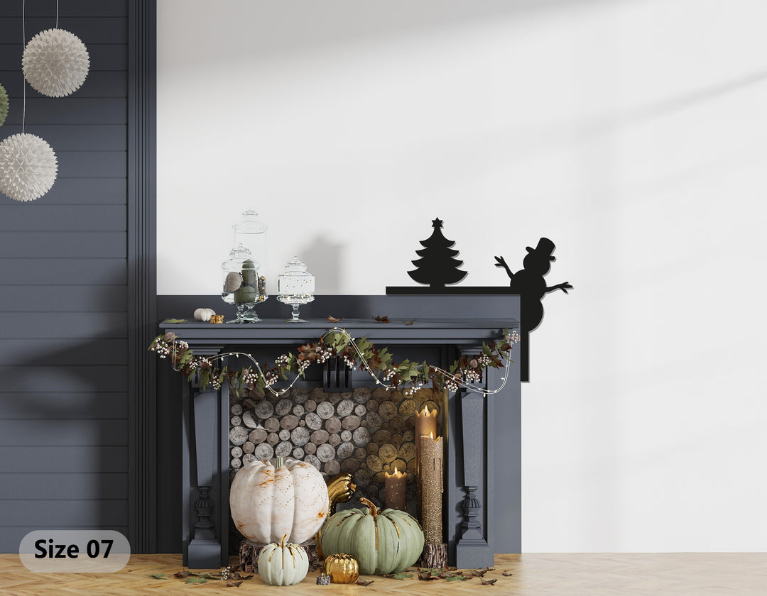 بهجة عيد الميلاد - ديكور معدني للمدفأة على شكل رجل ثلج وشجرة