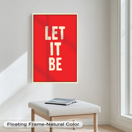 High color contrast defines this red 'Let It Be' oil painting artwork, a minimalist quote print with a modern aesthetic, against a neutral backdrop.
