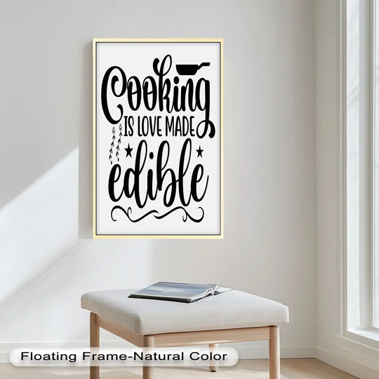 Subtle surface texture enhances the framed oil painting wall art displaying the 'Cooking Is Love Made Edible' quote, adding depth to the simple foodie design.