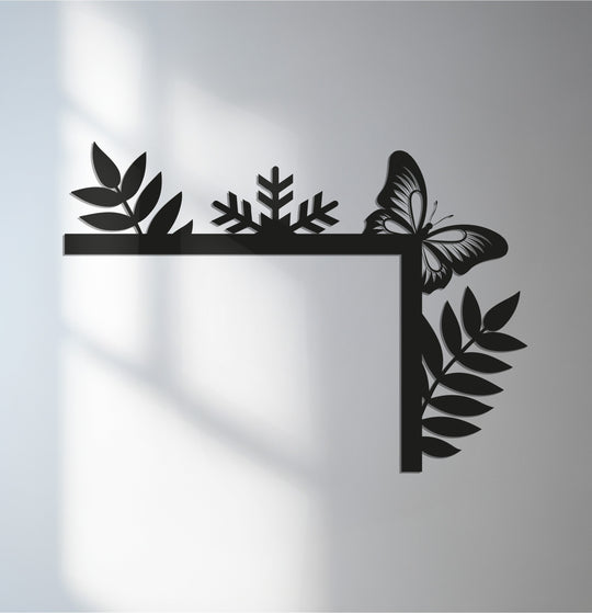 Illuminated background highlights the intricate butterfly and leaf design of this nature-inspired metal wall decor, a stylish addition to any home decor setting.