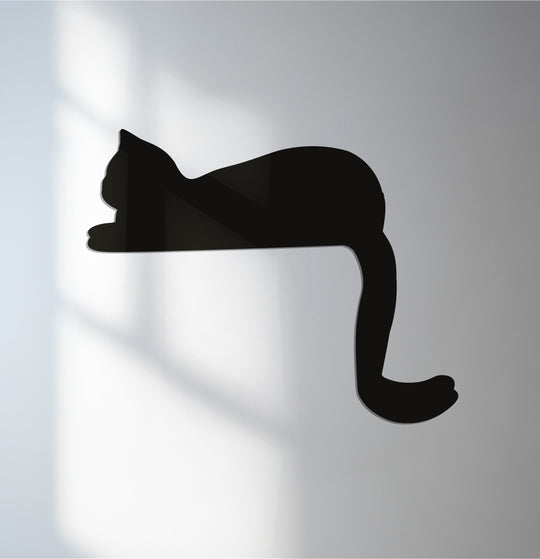 The precise border defines the cat-shaped metal artwork, adding a sleek and modern element to the fireplace décor with its minimalist edge.