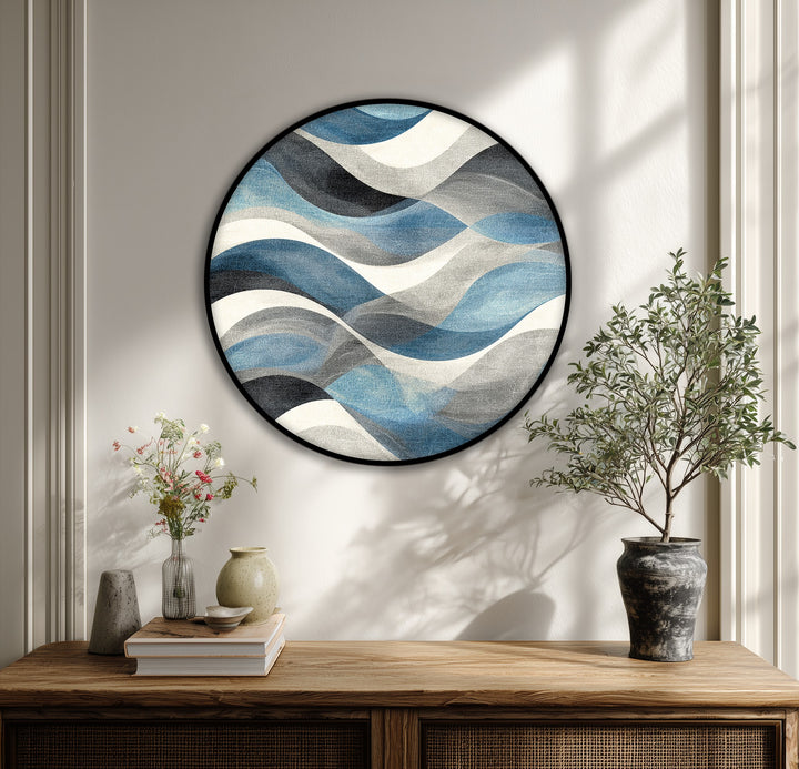 Transitioning from shades of deep blue to soft grays, this flowing waves abstract round canvas print exemplifies big canvas prints with its coastal-inspired design.