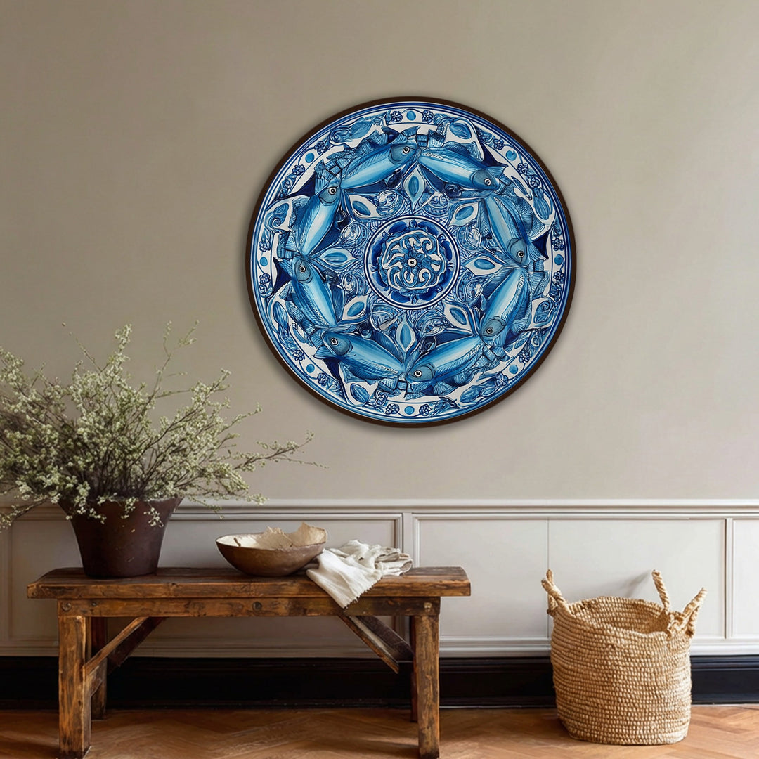 Gentle curves in the blue fish mandala design create a sense of movement in this round canvas wall decor, bringing coastal decorative charm to your space.