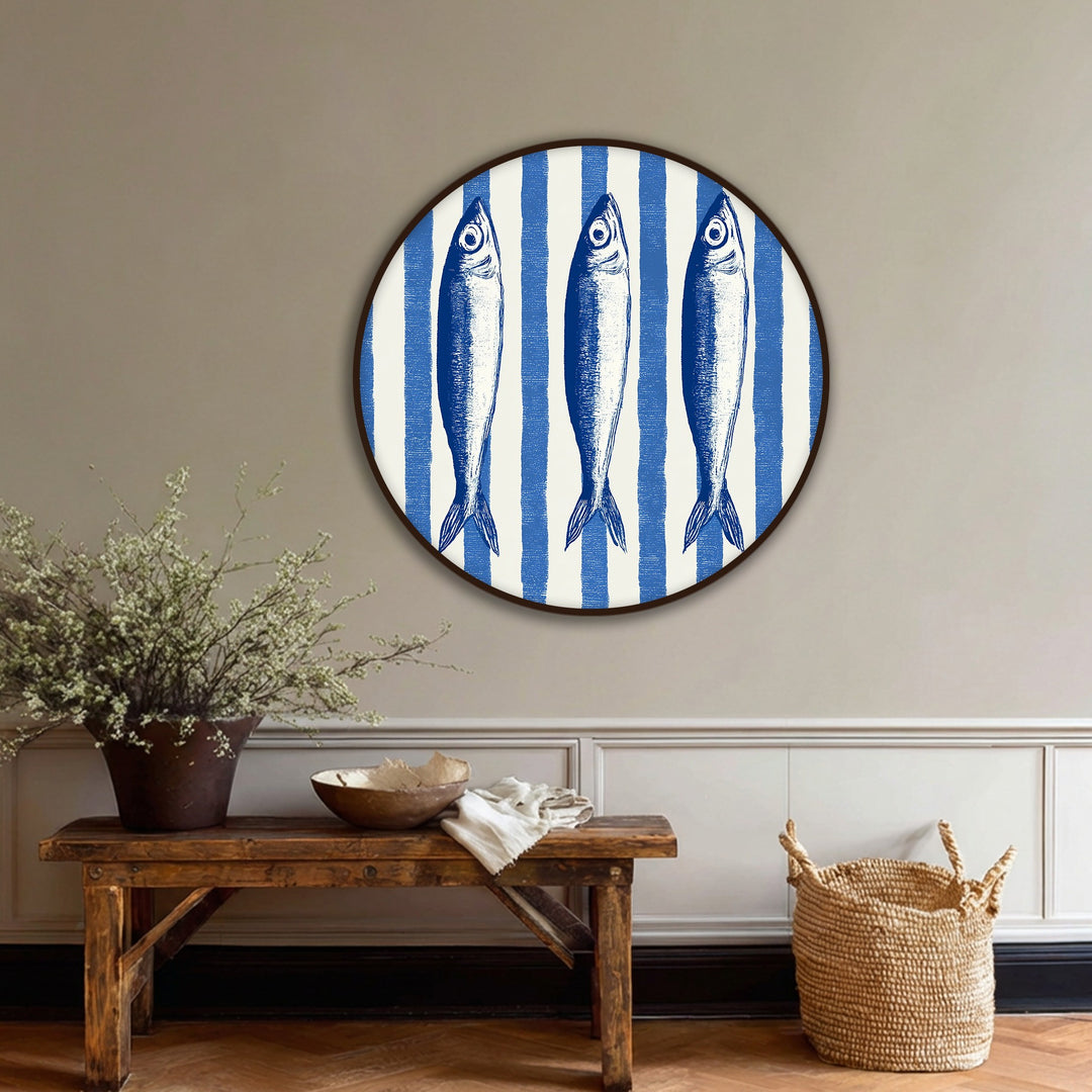 The focal point of the big canvas prints is the trio of blue fish illustrations against a bold, nautical striped backdrop, offering a captivating coastal aesthetic.