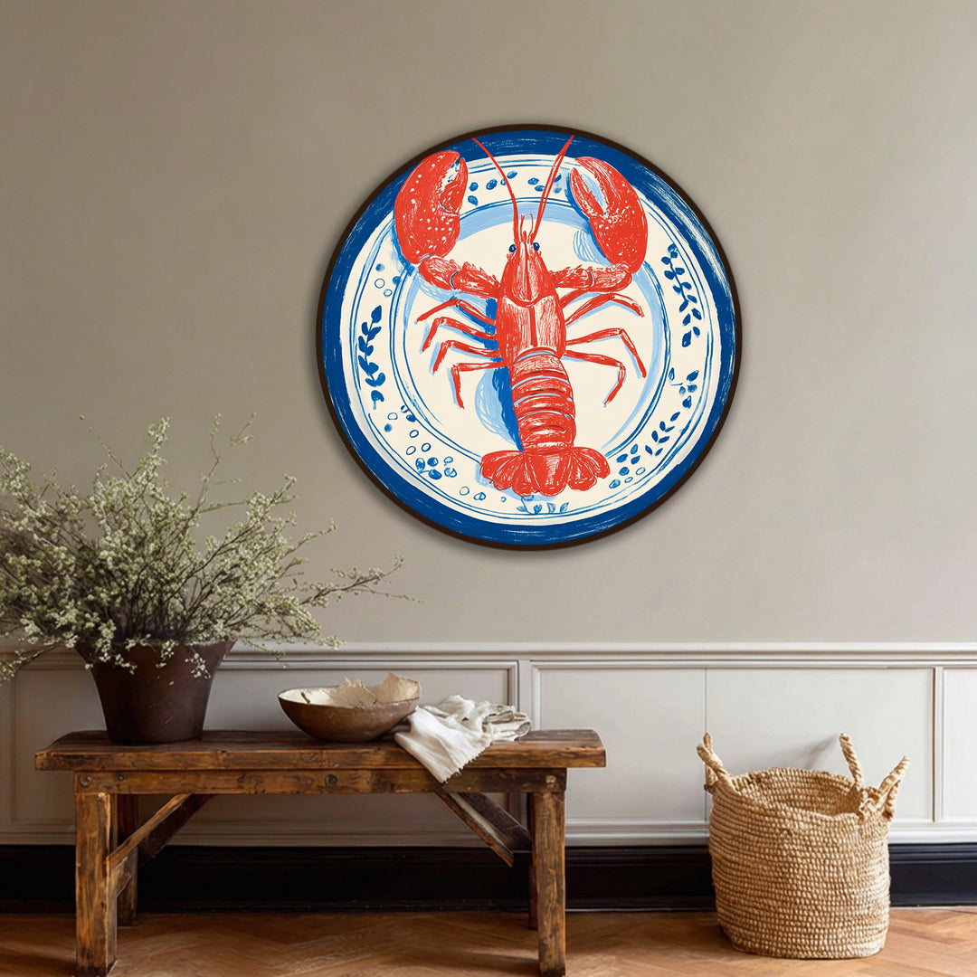 Bold red lobster stands out against the blue and white plate in this hanging canvas, creating a striking color contrast for coastal kitchen wall art.