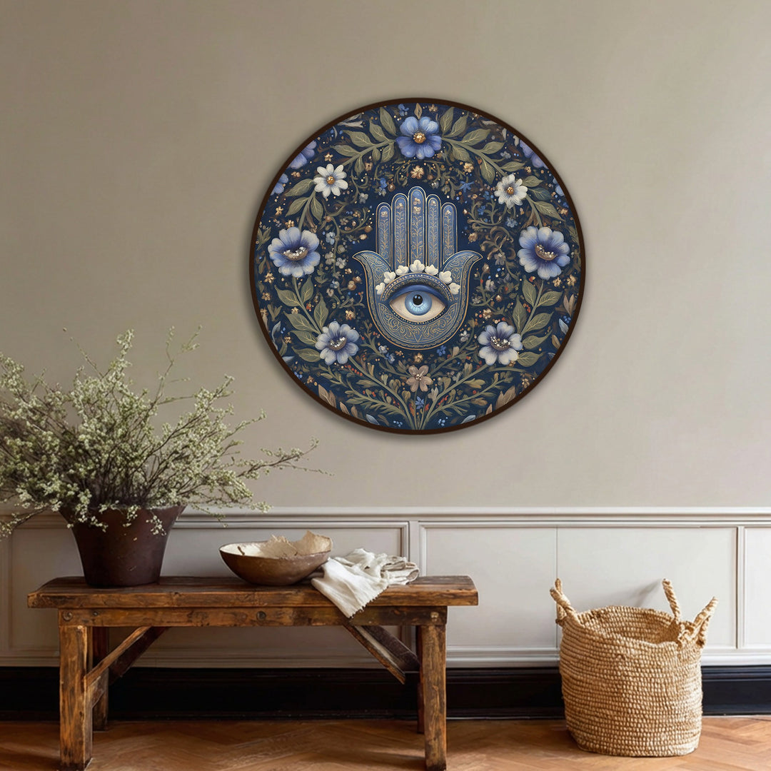 Cool tones dominate this round canvas painting, showcasing a floral Hamsa eye design on a navy canvas print with elegant, spiritual botanical elements.