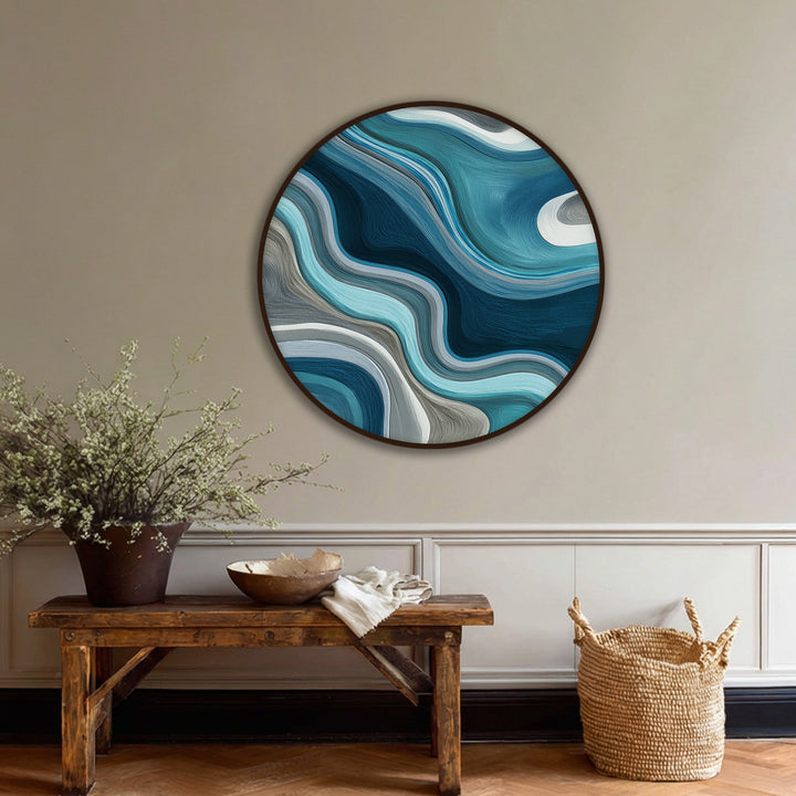 Bold color contrast defines the fluid teal waves round canvas wall art with a modern abstract design, perfect as canvas wall art.