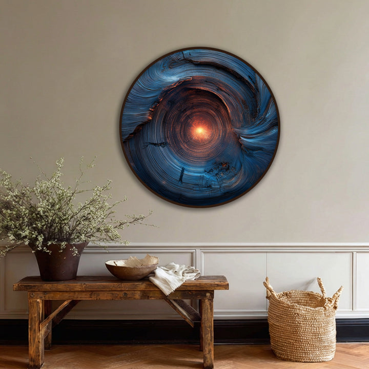 Predominantly blue, the radiant core abstract round canvas art prints reveal a swirling vortex of energy encapsulated in a striking modern wall art piece.