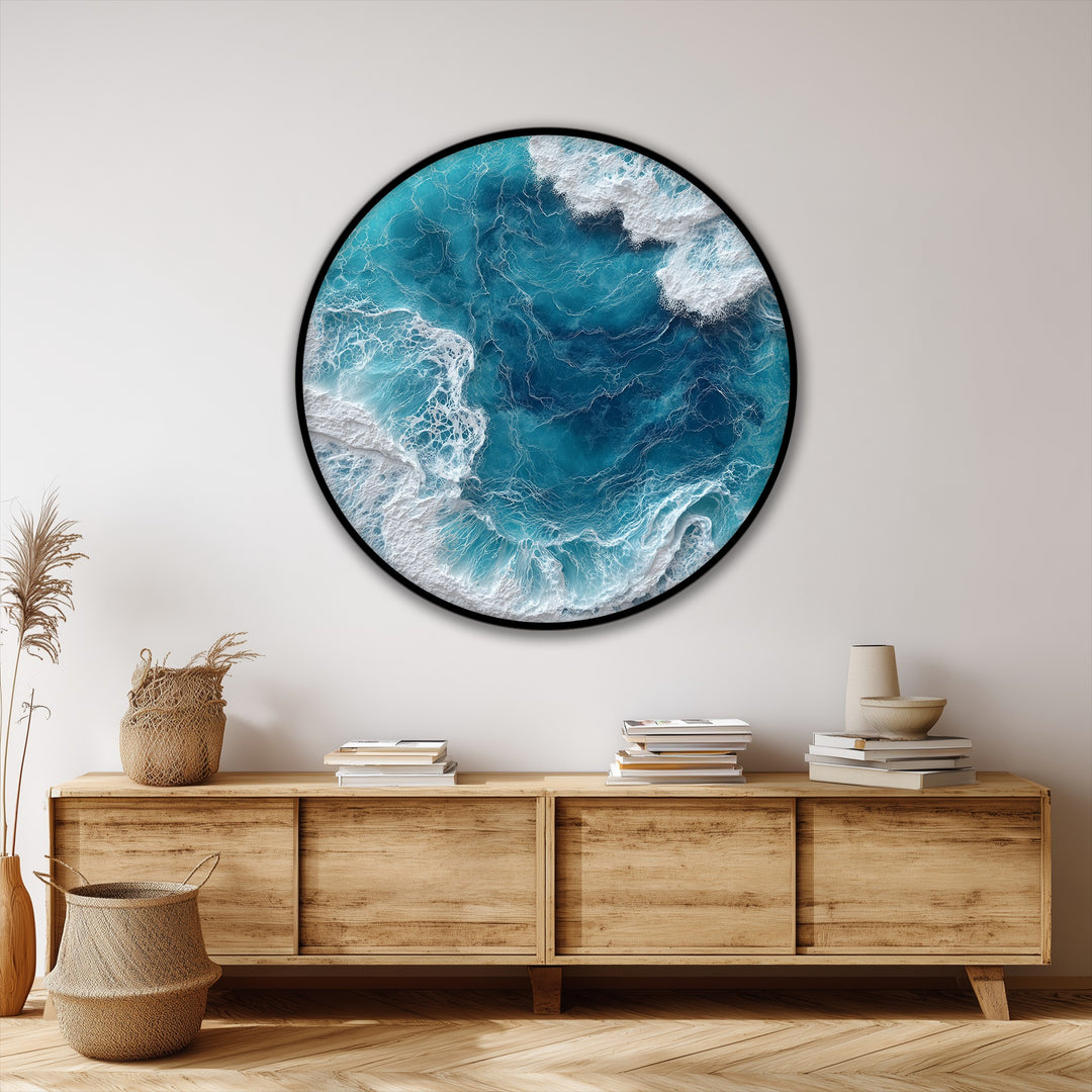 Ocean wave aerial round canvas print boldly displays a captivating turquoise sea with its crashing white surf, making it a striking unique canvas print.