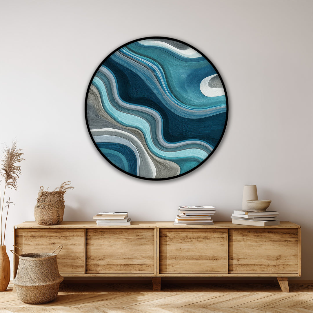 The layering effect in this round canvas art prints showcases the fluid teal waves, creating a modern abstract wall art piece.