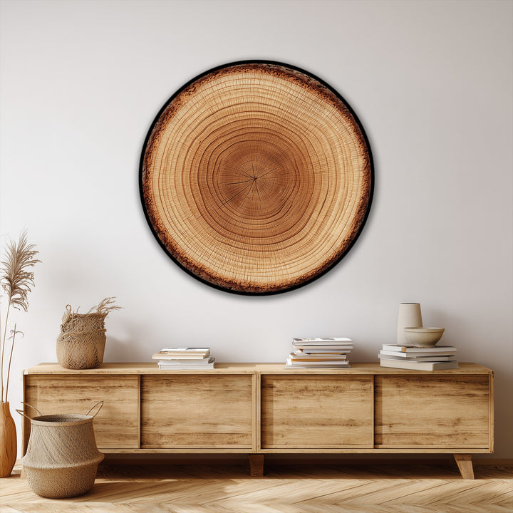 Defined by its dark border, the natural wood texture wall art features a slice of tree ring design, showcasing a ready to hang canvas edge for a modern aesthetic.