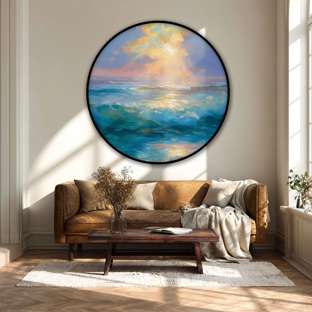 The central subject is a round canvas artwork featuring golden light streaking across turquoise waves in a serene ocean sunrise scene.