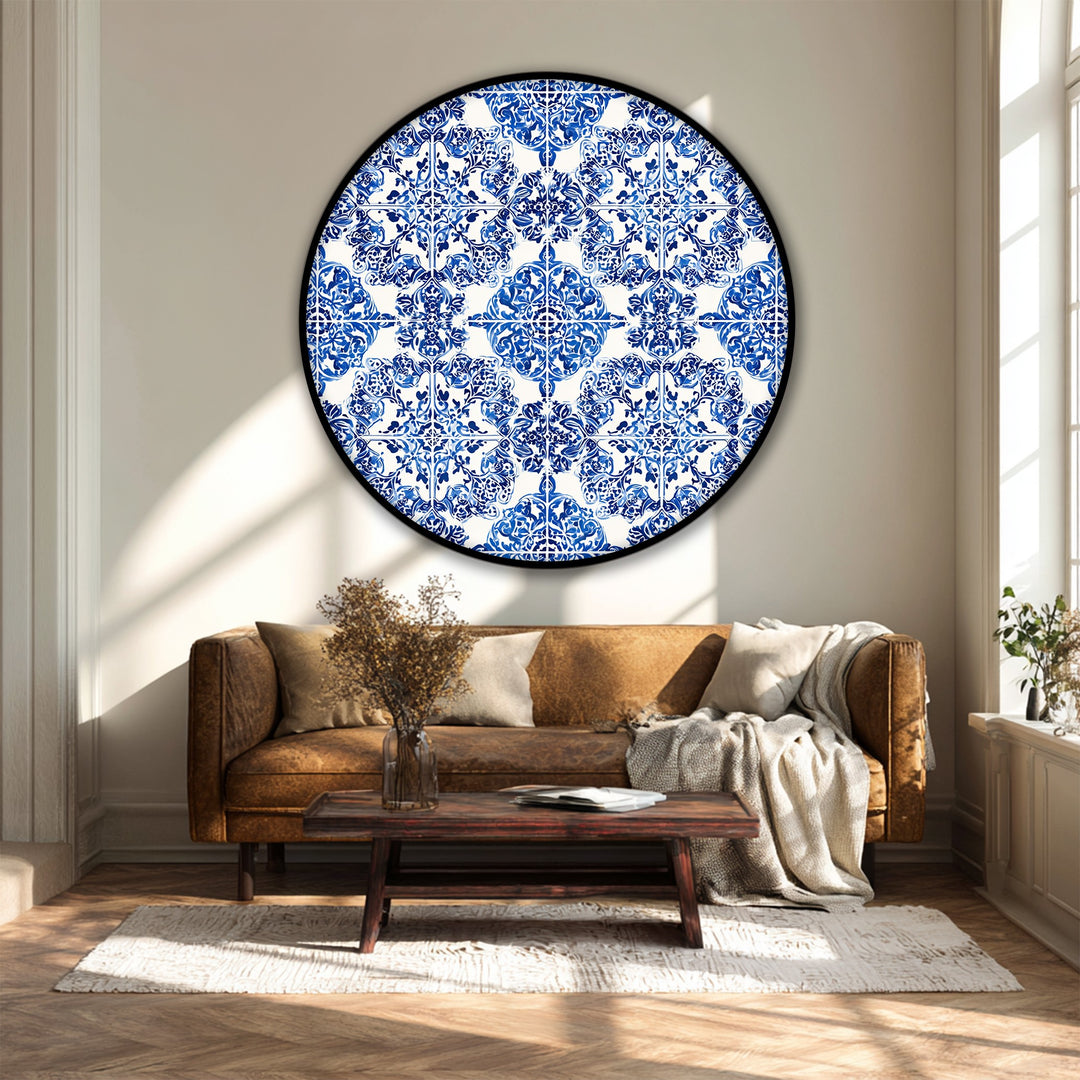 Featured is the central subject of a round canvas artwork showcasing a blue ornamental tile pattern, adding classic ceramic style as canvas artwork to the wall.