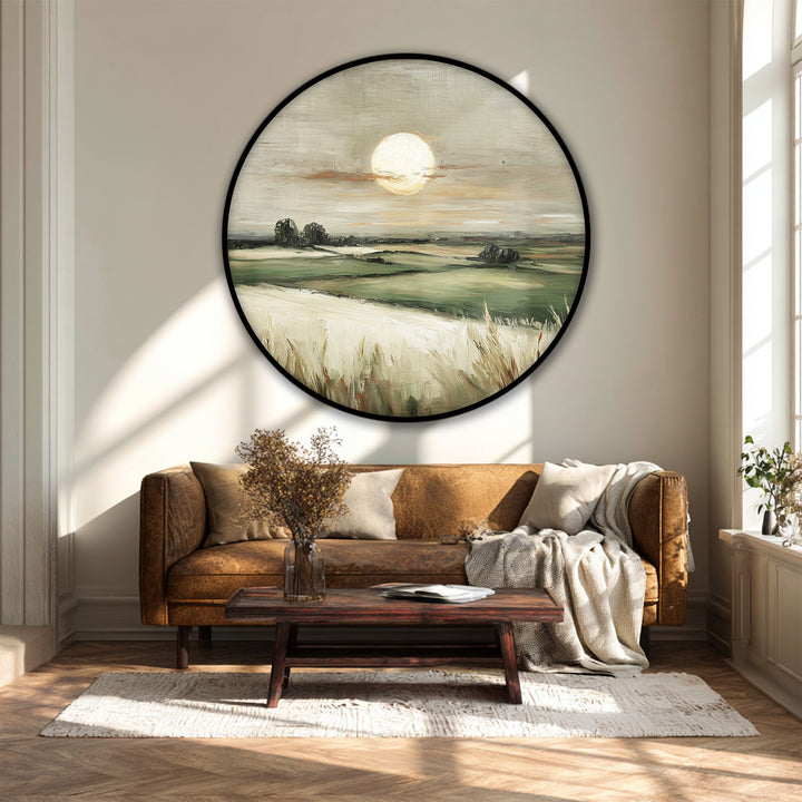 Featuring a low color saturation, the golden horizon landscape canvas art prints highlight a serene field in a round canvas print for a calming wall art display.