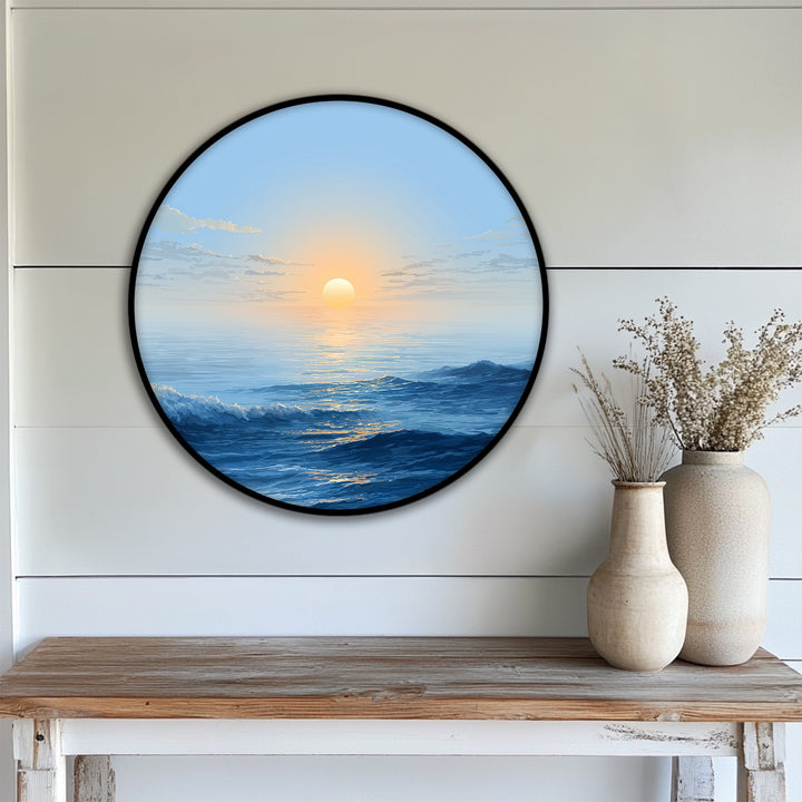 White shiplap walls serve as a backdrop for this minimalist ocean sunrise round canvas art prints, complementing the calm blue seascape's serene ambiance.